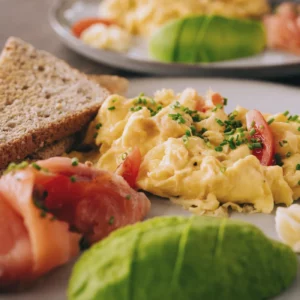 Scrambled eggs with smoked salmon, avocado and toast at Ocean Freaks Café