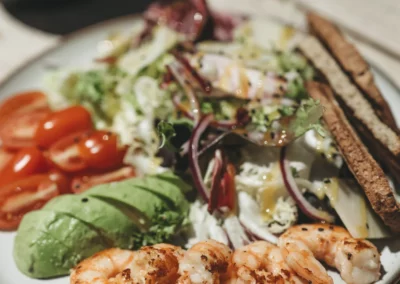 Shrimp salad with avocado, tomatoes and toast at Ocean Freaks Café