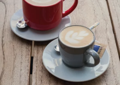 Two specialty coffees on the terrace at Ocean Freaks Café in Las Américas