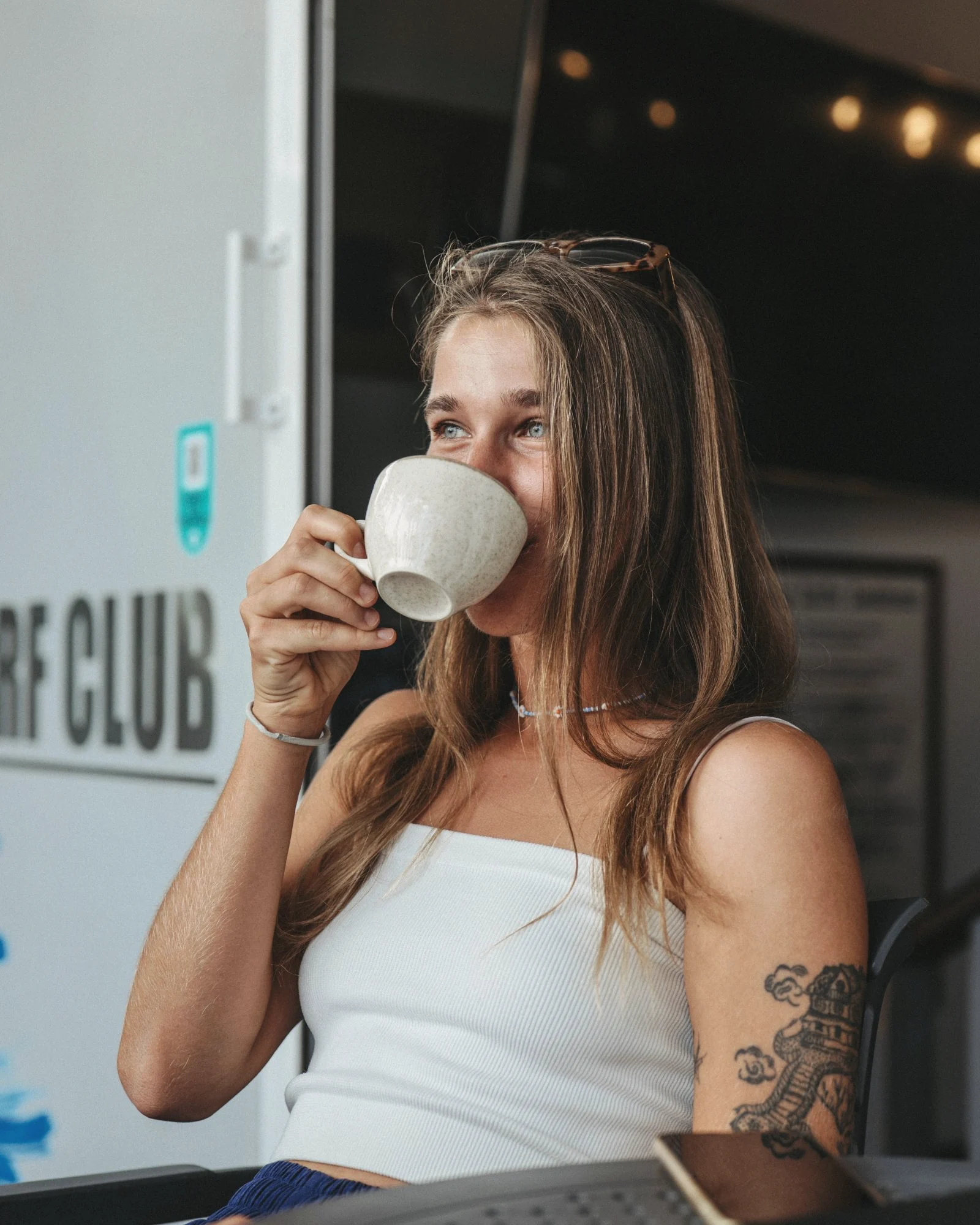 Guest enjoying specialty coffee at Ocean Freaks Café in Playa de las Américas