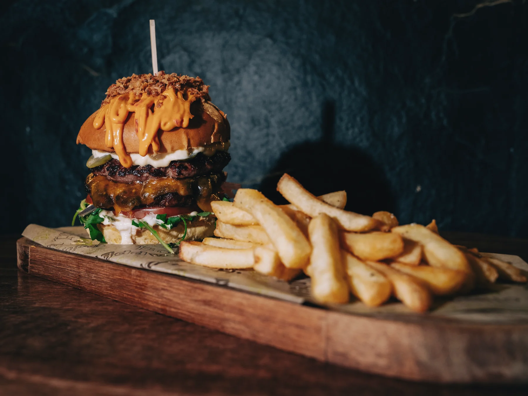 Smash burger with fries at Ocean Freaks Café